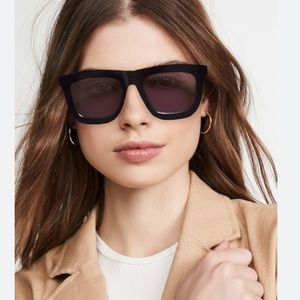 Karen Walker “deep worship” sunglasses, black frame with purple tint lens.